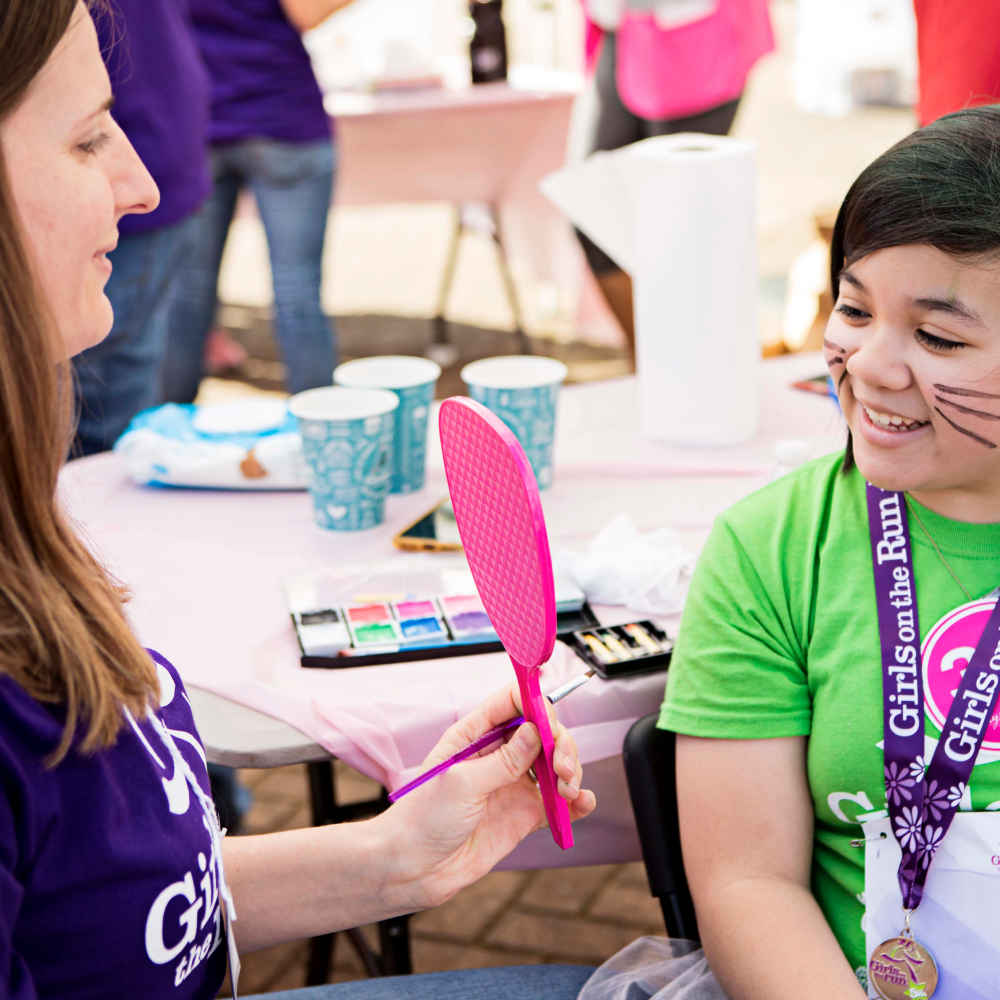 Image of volunteer with GOTR girl