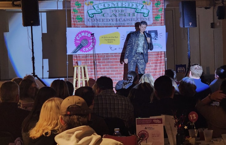 Photo of comedian Amy Tee performing at Girls on the Run Worcester County's 1st annual Comedy Night Fundraiser!